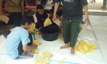 proses pembungkusan daging